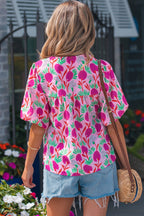 Colorful floral short sleeve women blouse from LuckeLadybug LLC in a stylish design