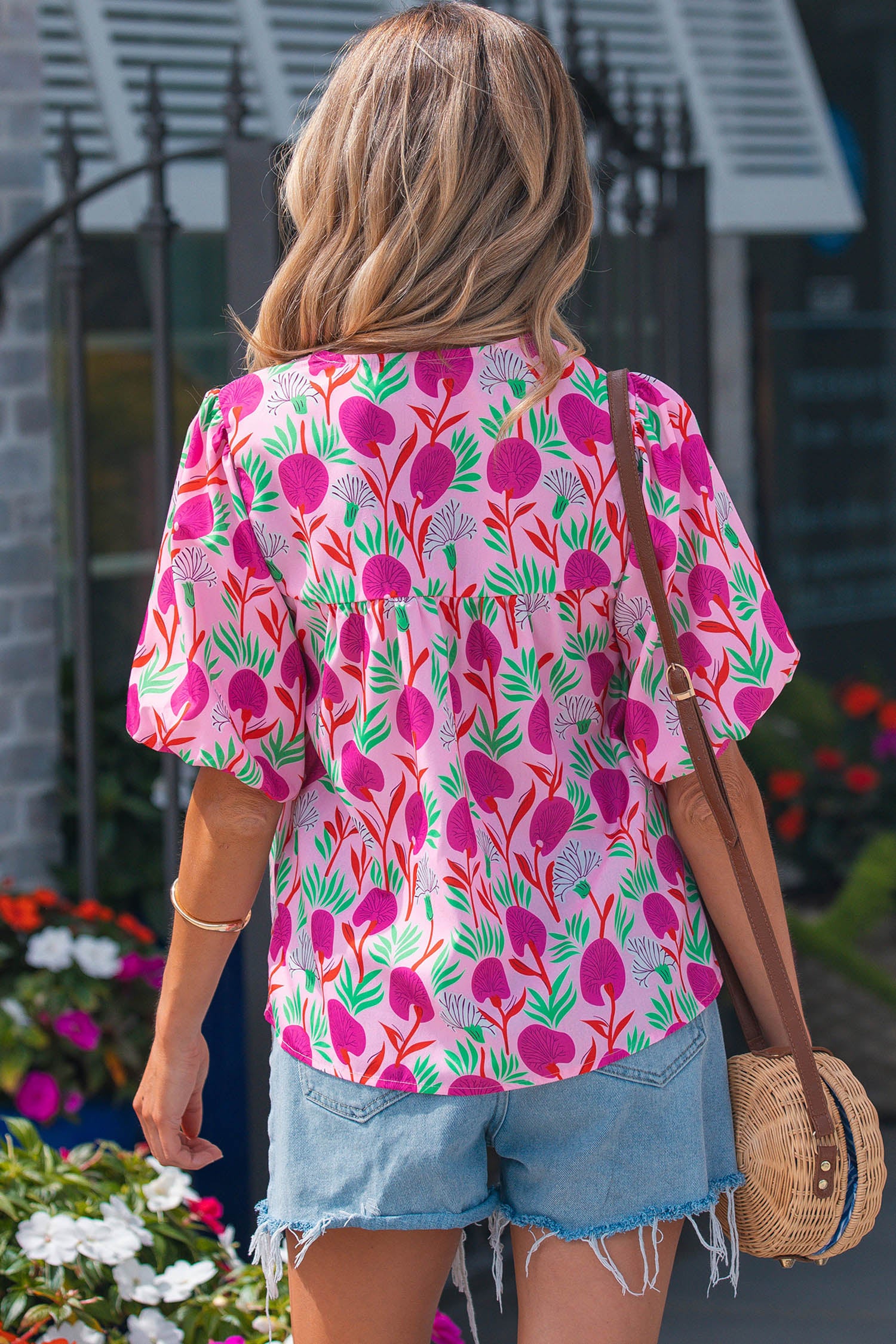 Colorful floral short sleeve women blouse from LuckeLadybug LLC in a stylish design