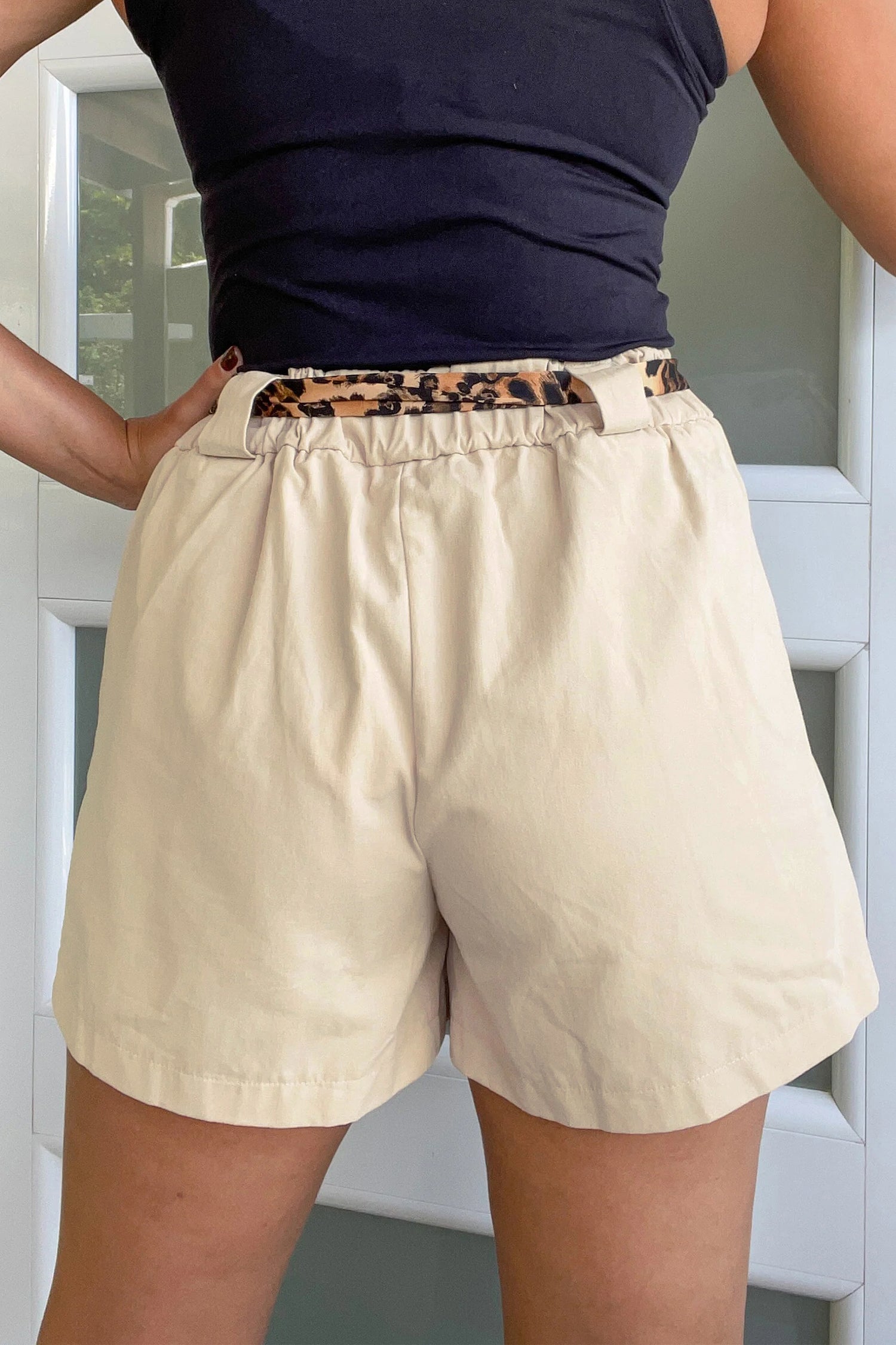 Beige LuckeLAdybug LLC shorts with animal print waistband, perfect for casual summer wear
