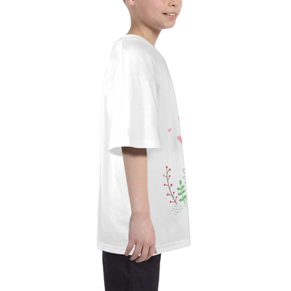 Side view of a child wearing a white bunny print kids shirt with floral design