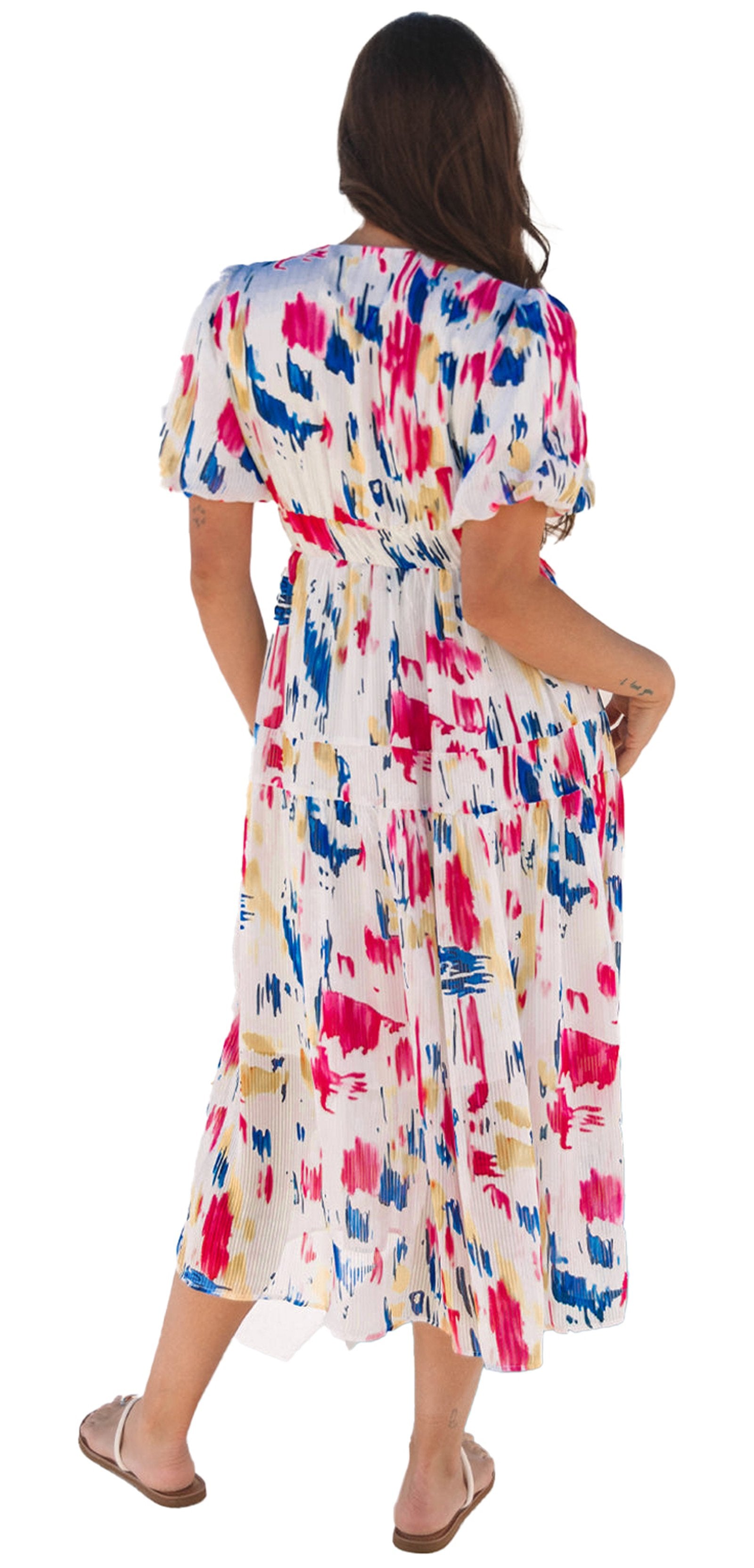 Sky blue abstract maxi dress with a colorful pattern and relaxed fit, perfect for summer outings