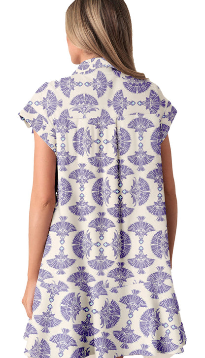 Back view of a sky blue printed mini dress with a floral pattern from LuckeLadybug