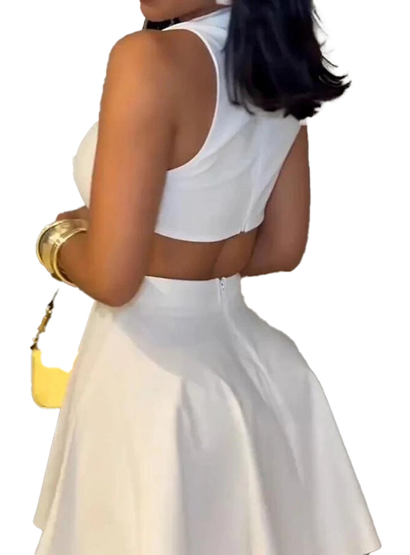 Back view of a model wearing a sleeveless V neck mini dress in white with a flared skirt