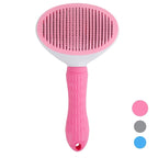 LuckeLadybug slicker dog brush with a pink ergonomic handle and stainless steel pins for effective grooming