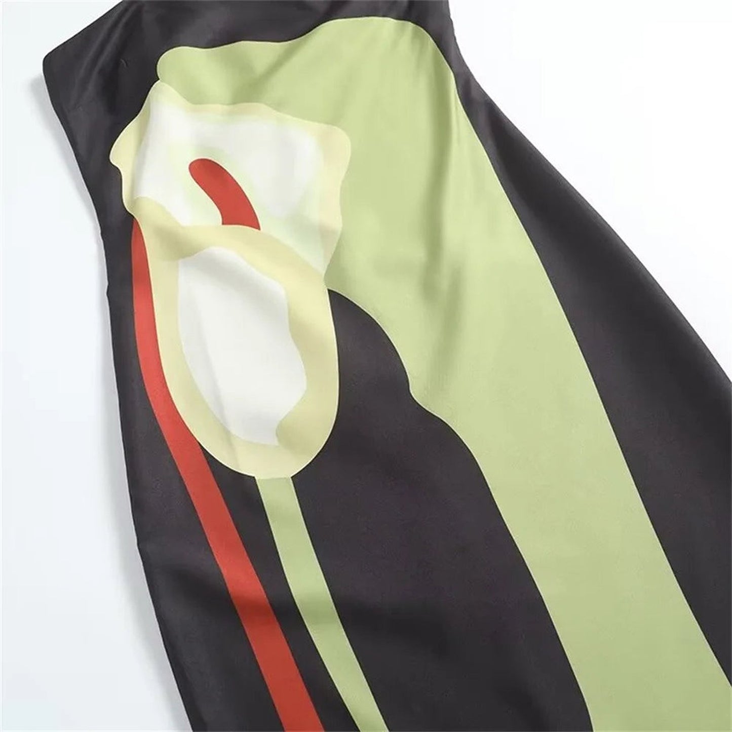 Stylish strapless backless summer dress by LuckeLadybug LLC featuring vibrant floral patterns