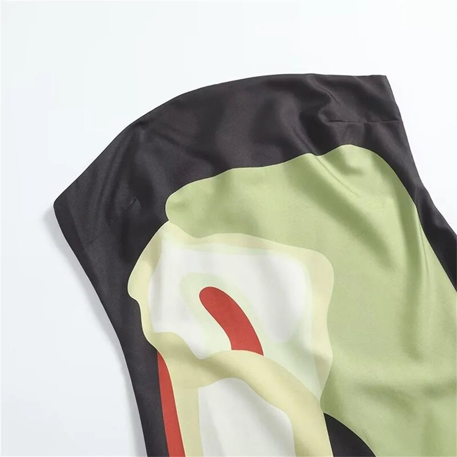 LuckeLadybug LLC A-line strapless backless summer dress with a colorful abstract design