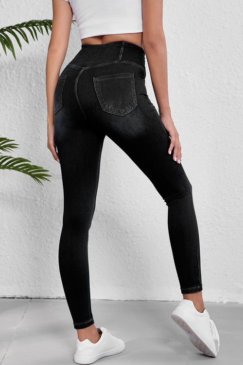 Black stretchy jeggings from LuckeLAdybug LLC with high-waisted design and a fitted silhouette