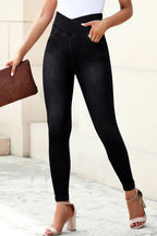 Black stretchy jeggings from LuckeLAdybug LLC with a high-waisted design and front pockets
