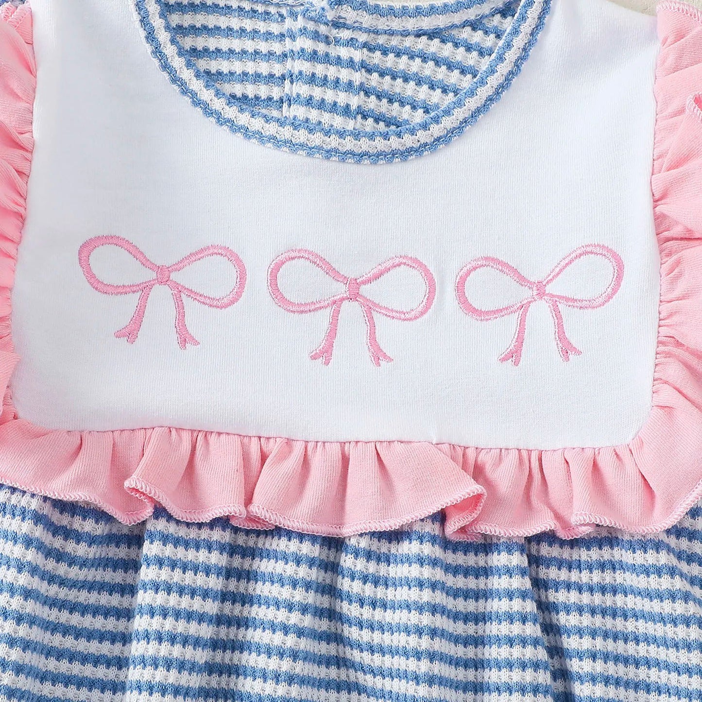 Striped long sleeve baby bodysuit with pink ruffle trim and embroidered bows from LuckeLadybug LLC