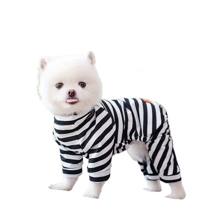 Cute small dog wearing striped pajamas for small dogs from LuckeLadybug LLC
