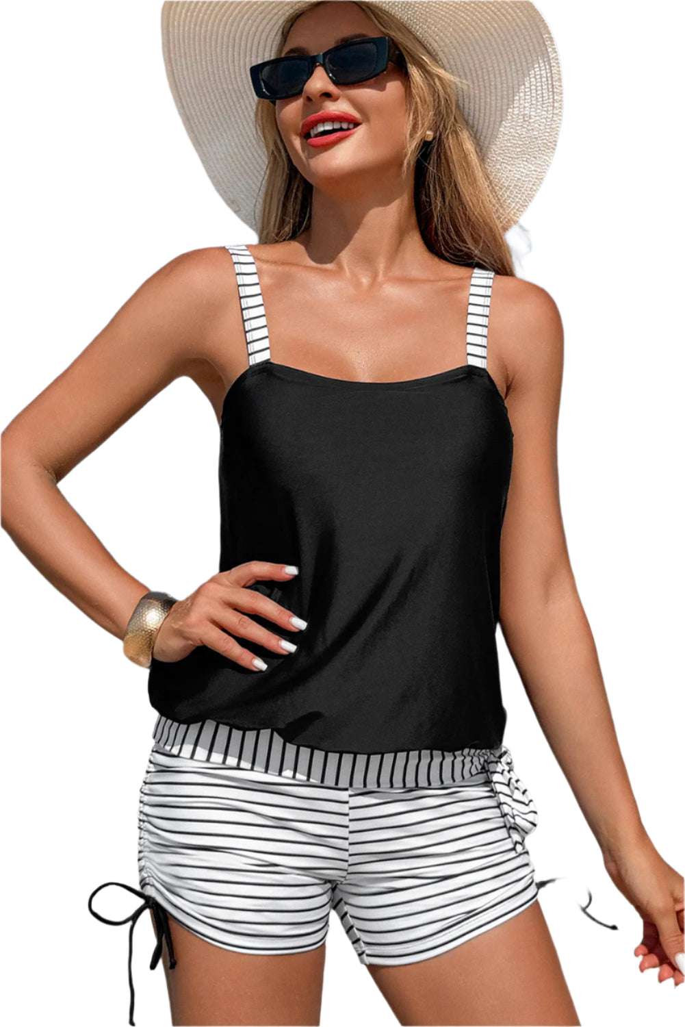 LuckeLadybug LLC striped tankini set for beach vacations with black top and striped shorts