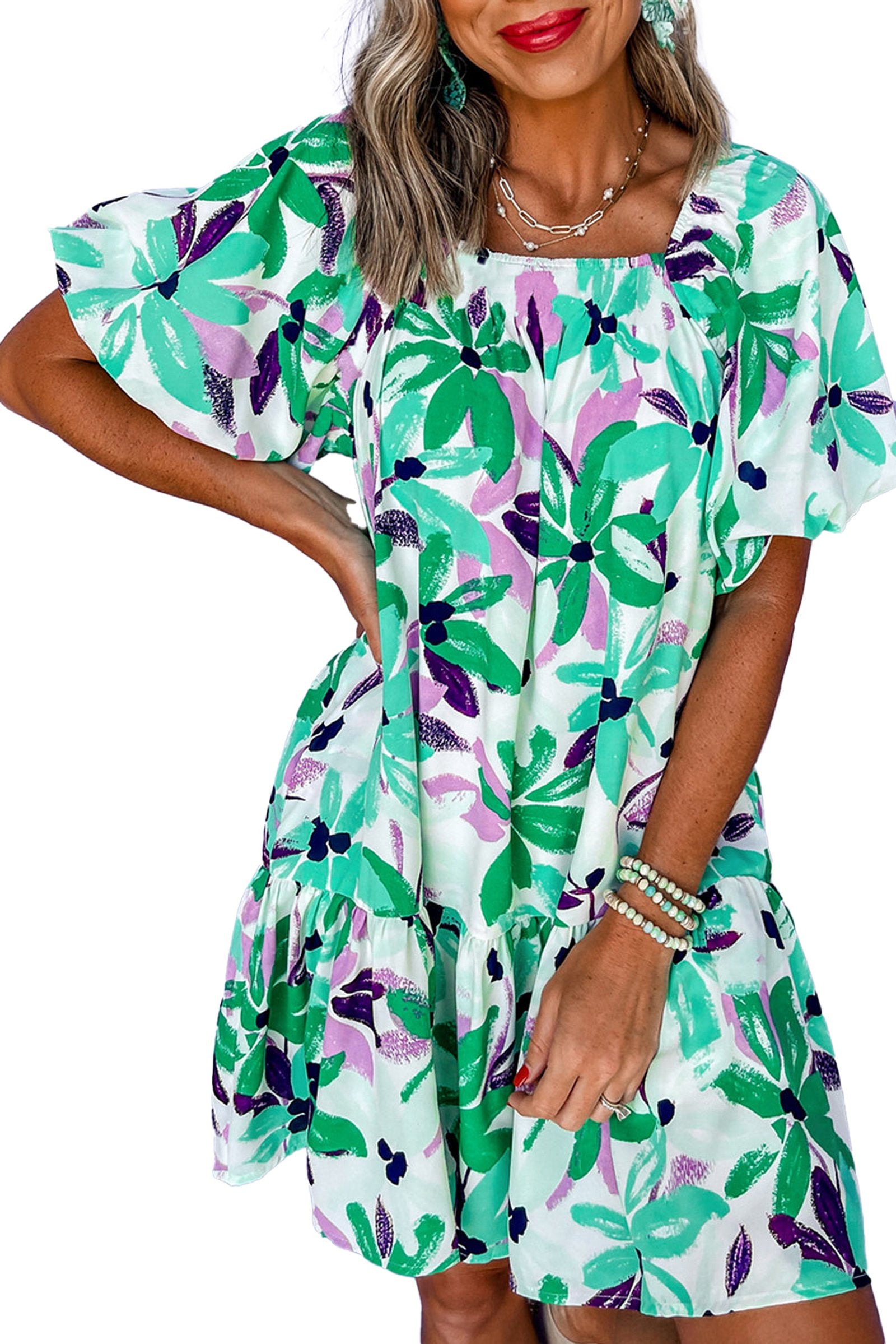 Model wearing LuckeLadybug green floral mini dress with puff sleeves ruffle hem square neckline casual summer style