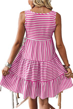 LuckeLadybug black striped mini dress listing shown in pink white sleeveless tiered mini dress back view