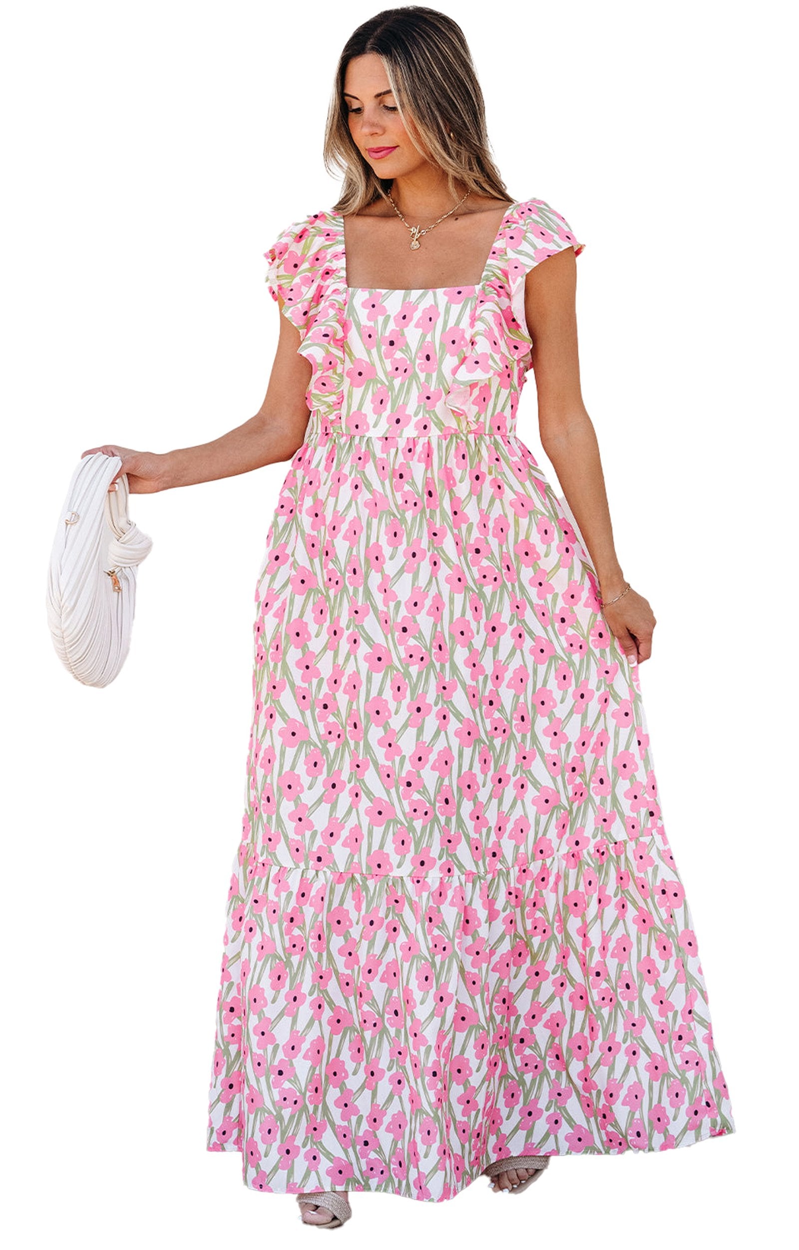 Model wearing LuckeLadybug pink floral maxi dress with square neckline cap sleeves tiered skirt holding white woven bag