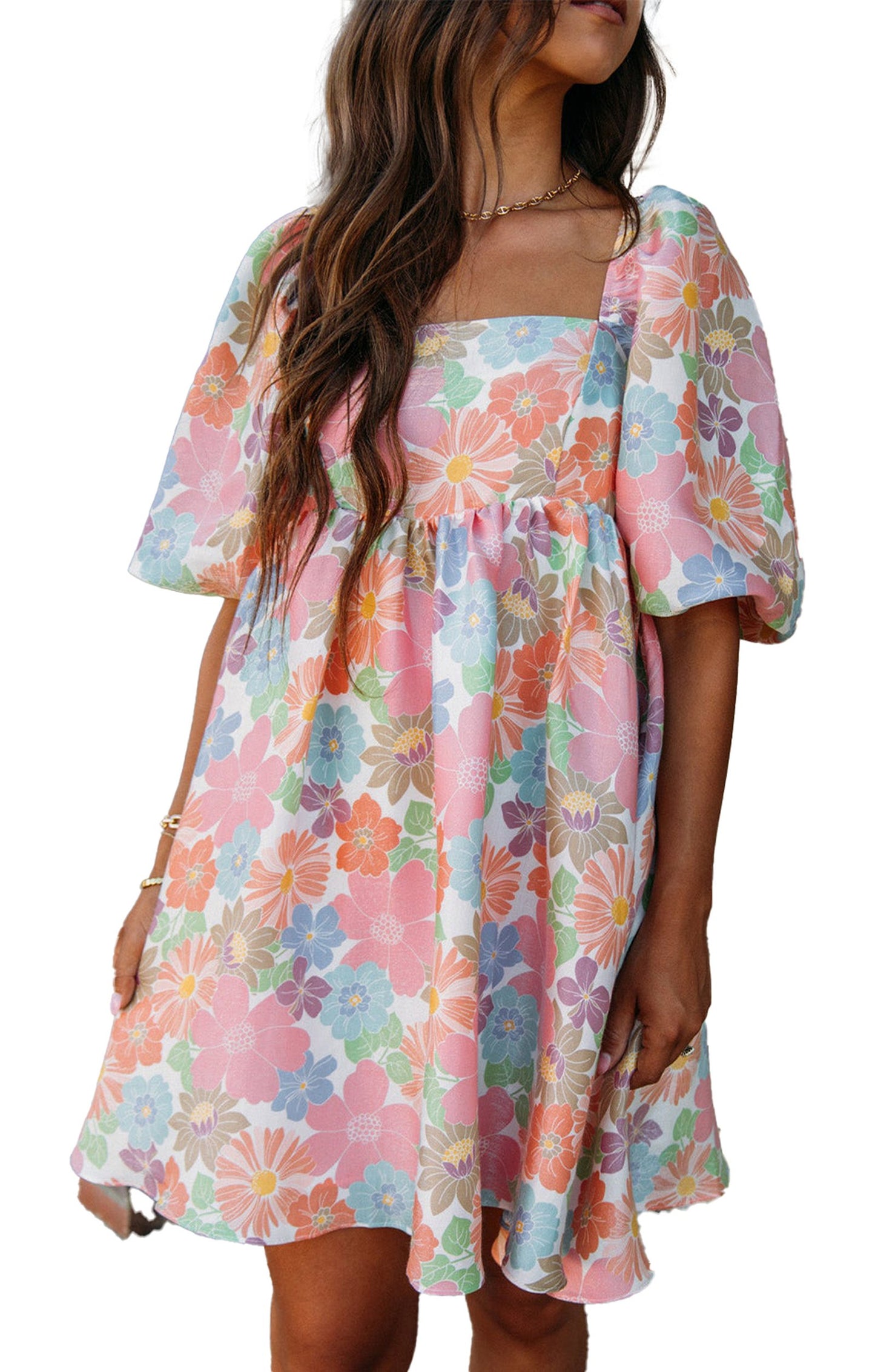 LuckeLadybug pink floral babydoll dress with puff sleeves square neckline and pastel daisy print on model