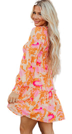 LuckeLadybug orange abstract print mini dress with long sleeves smocked waist ruffle hem