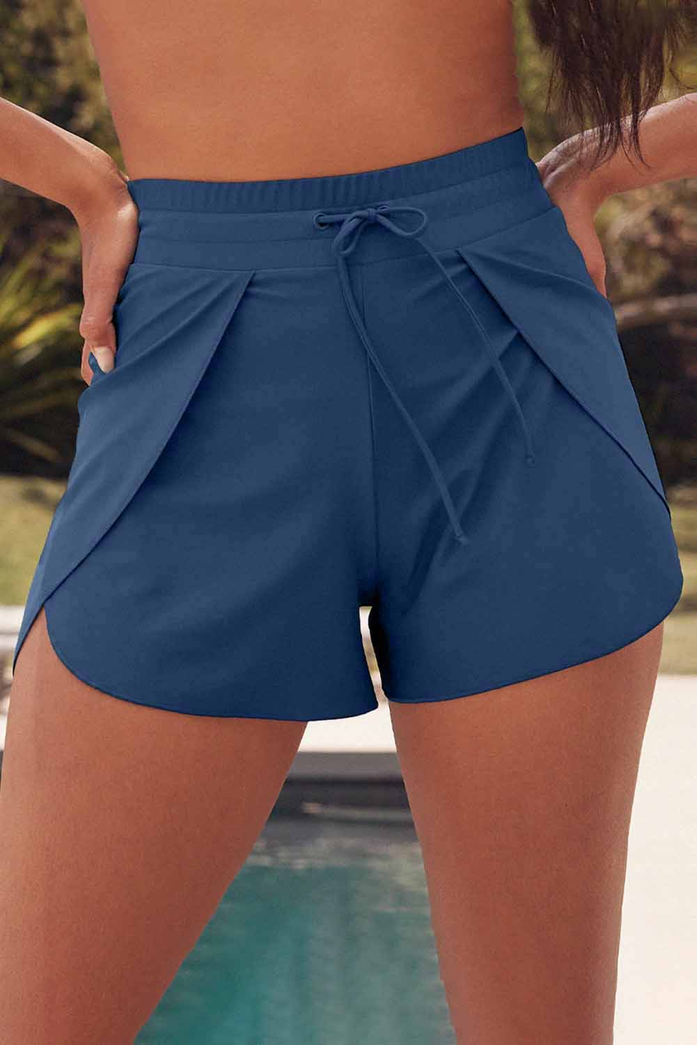 LuckeLadybug men's swim shorts in blue with a sleek design perfect for poolside relaxation
