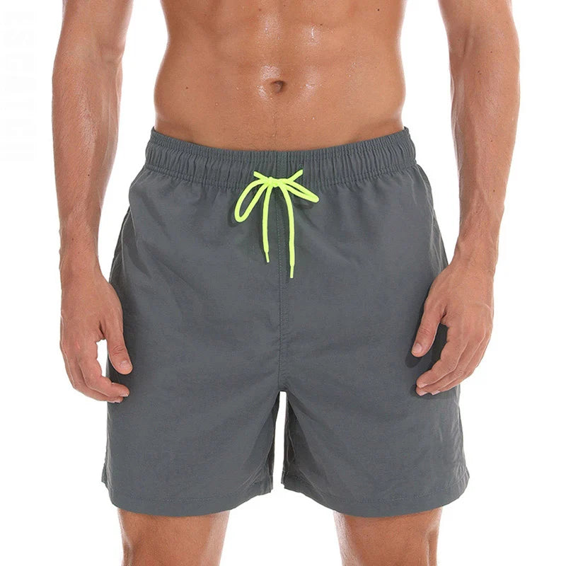 Gray swim shorts men with elastic waistband and neon drawstring for comfortable beach wear