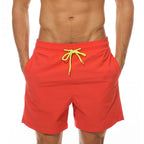 LuckeLadybug men's swim shorts in vibrant red with contrasting yellow drawstring for a stylish look