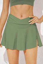 LuckeLadybug green skort designed for swimmers swimwear with a stylish crossover waistband