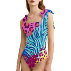 LuckeLadybug One-Piece Swimsuit in Animal Print Cheetah with Colorful Straps and Bold Design