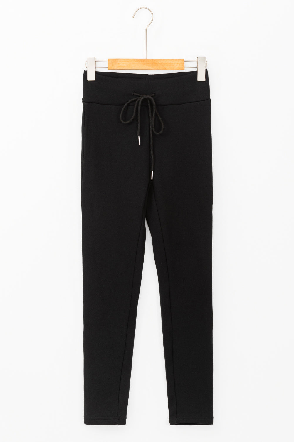 Black LuckeLadybug LLC thermal leggings featuring a comfortable drawstring waist for a perfect fit