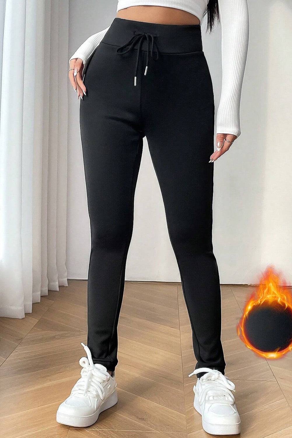 Black thermal leggings from LuckeLAdybug LLC with drawstring waist and a slim fit