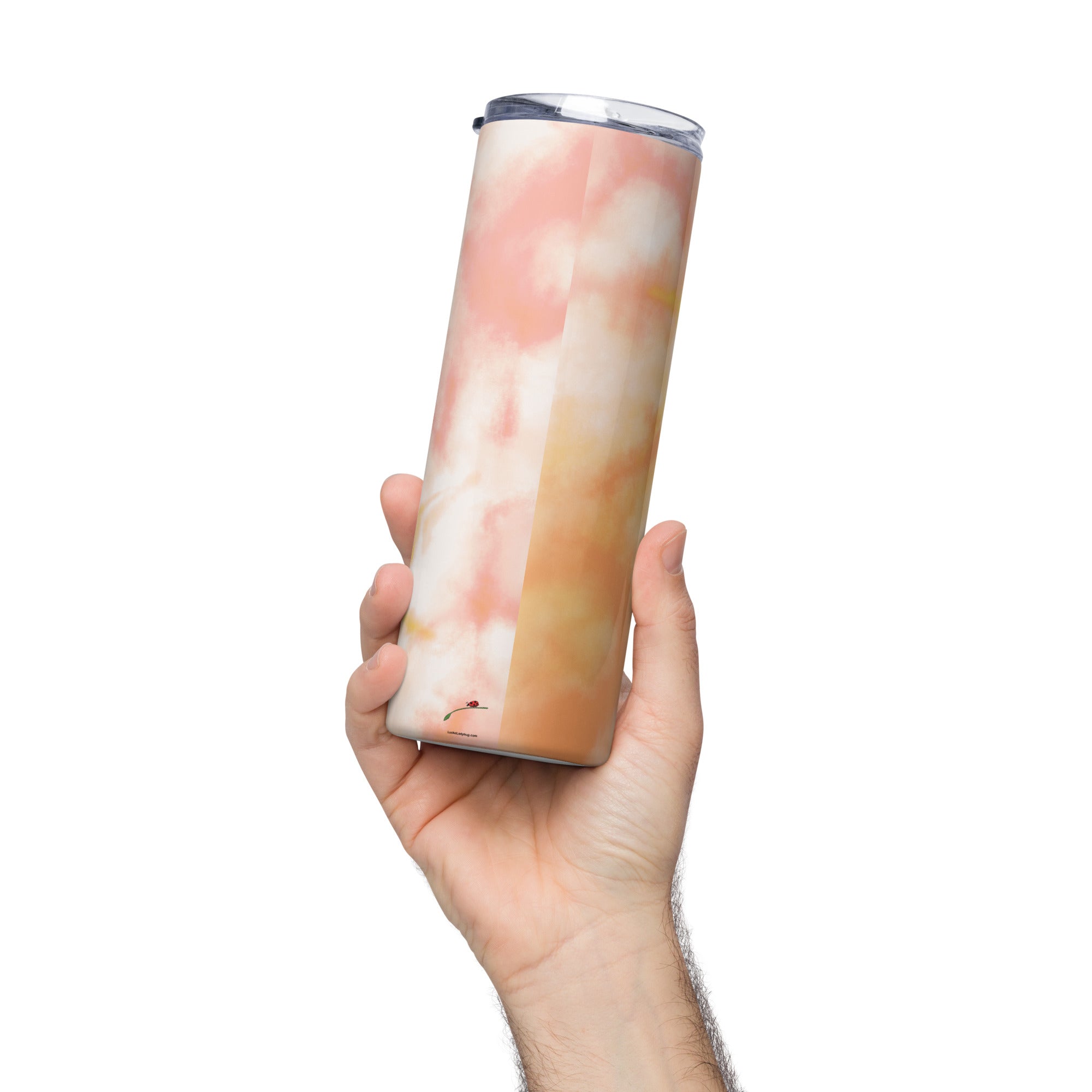 Hand holding a LuckeLadybug tie dye stainless steel tumbler with pink and orange gradient design