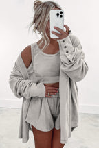 Women's beige lounge shorts paired with a cozy top tank tops and cardigan for a relaxed look