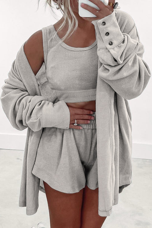 Casual gray shorts outfit styled with a cozy cardigan and top tank tops for a relaxed look