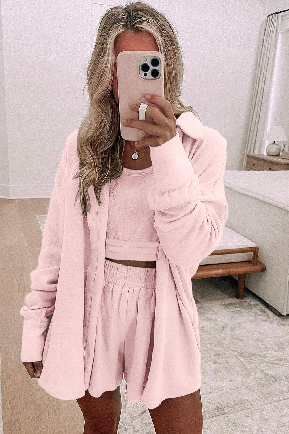 Light pink shorts set styled with a matching tank top, ideal for pairing with top tank tops