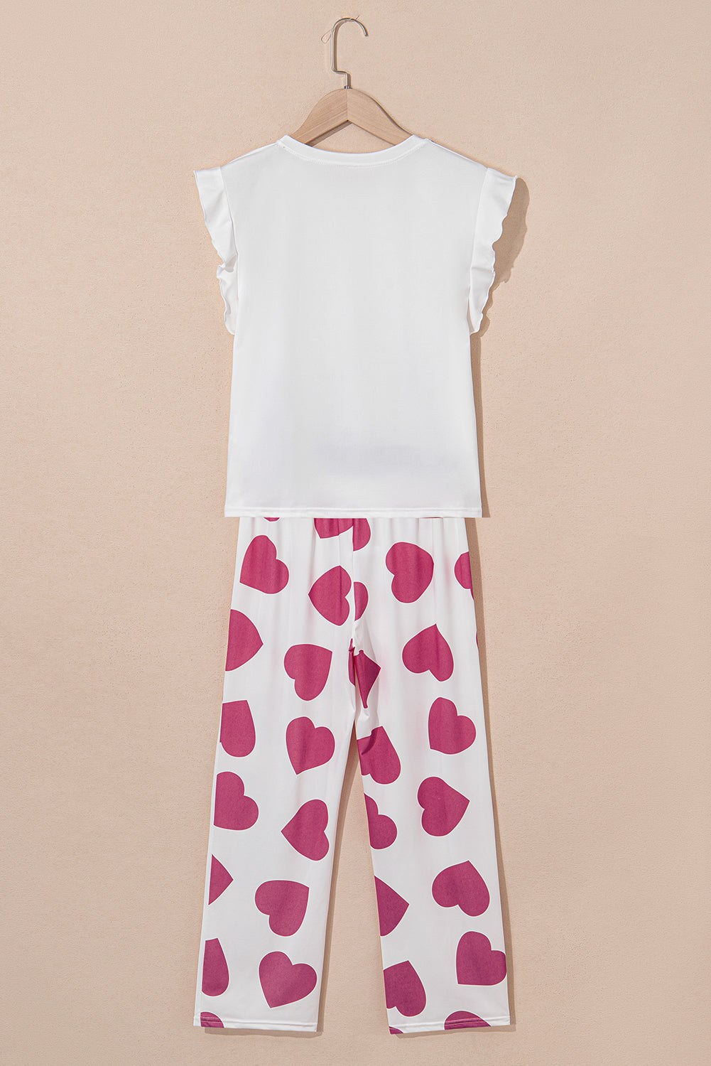 LuckeLadybug LLC cute pants with heart print paired with a white top tank tops for stylish comfort