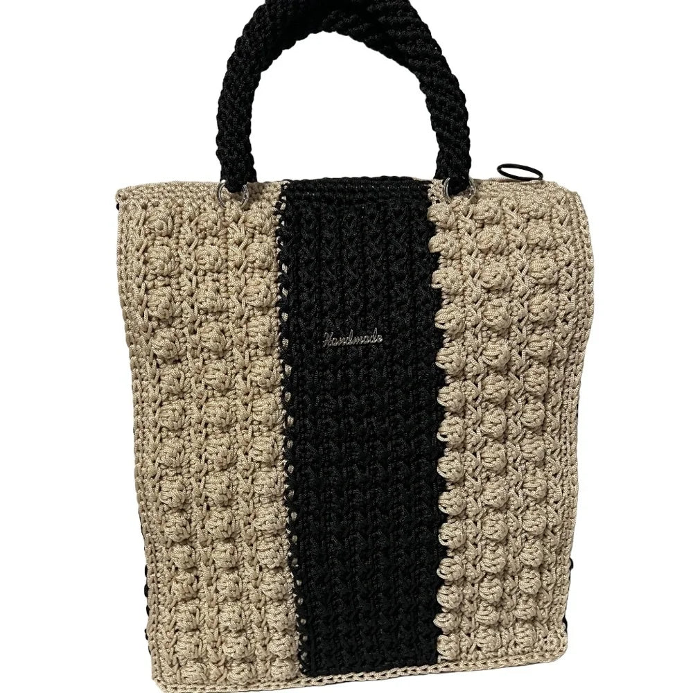 Handcrafted tote bag in beige and black, featuring stylish crochet design and durable straps