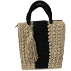 Stylish handmade tote bag with a black and beige design featuring a decorative tassel