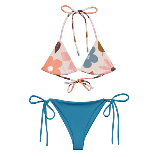  trendy two-piece swimwear for women with floral print top and solid blue tie-side bottoms
