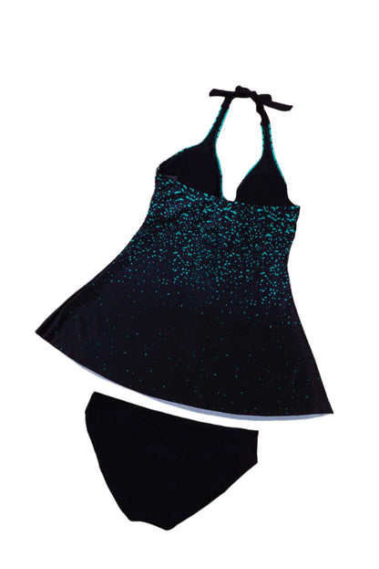LuckeLadybug LLC turquoise halterneck tankini with a black flowing bottom and halter tie neck