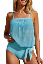 LuckyLadybug LLC turquoise tankini swimsuit with ribbed top and tie-side bottom on beach background