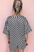 Back view of two piece pants set casual in black and white checkered pattern, featuring loose top and shorts