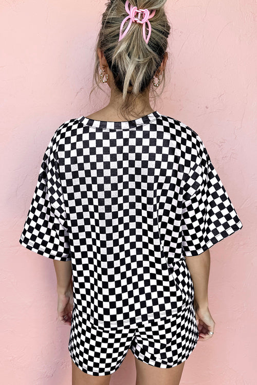 Back view of two piece pants set casual in black and white checkered pattern, featuring loose top and shorts