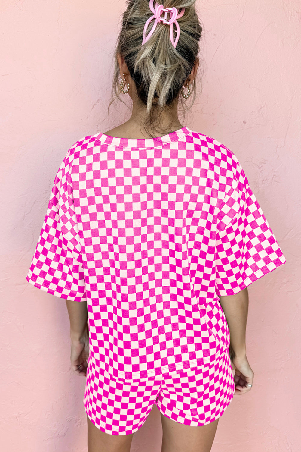 Pink and white checkered two piece pants set casual with loose fit top and shorts for stylish comfort