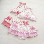 LuckeLadybug LLC High Waist Bikini featuring a two piece swimsuit with playful polka dot and fruit designs