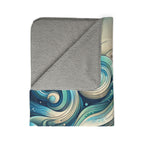 ultra soft abstract sherpa blanket with swirled blue and beige wave pattern and cozy gray sherpa backing