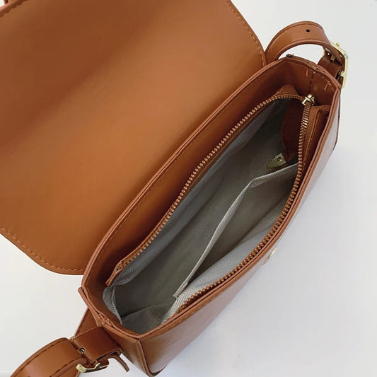 Brown LuckeLadybug underarm designer handbag for women with spacious interior and stylish design