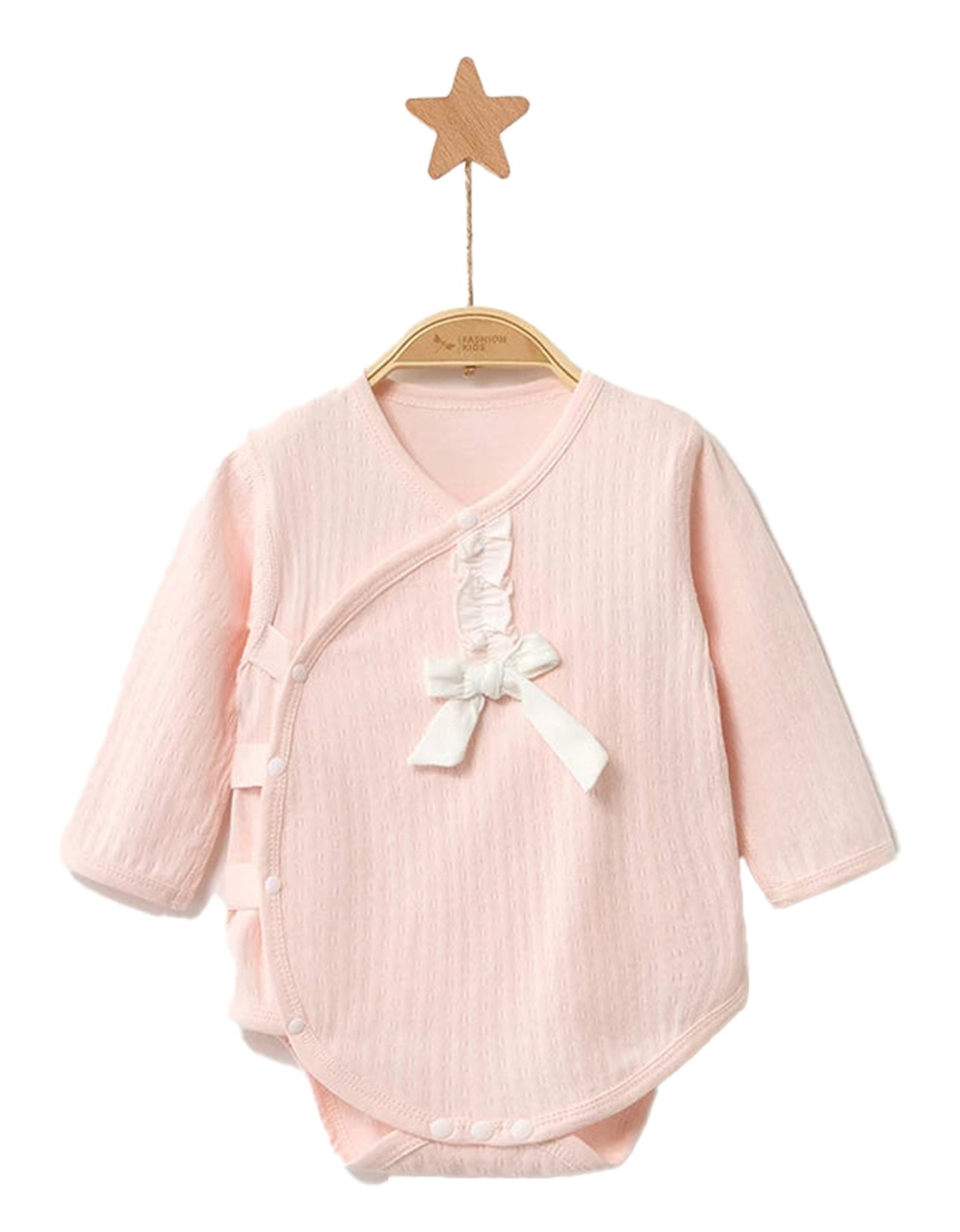 LuckeLadybug LLC unisex baby cotton rompers in soft pink with a cute bow and snap closures