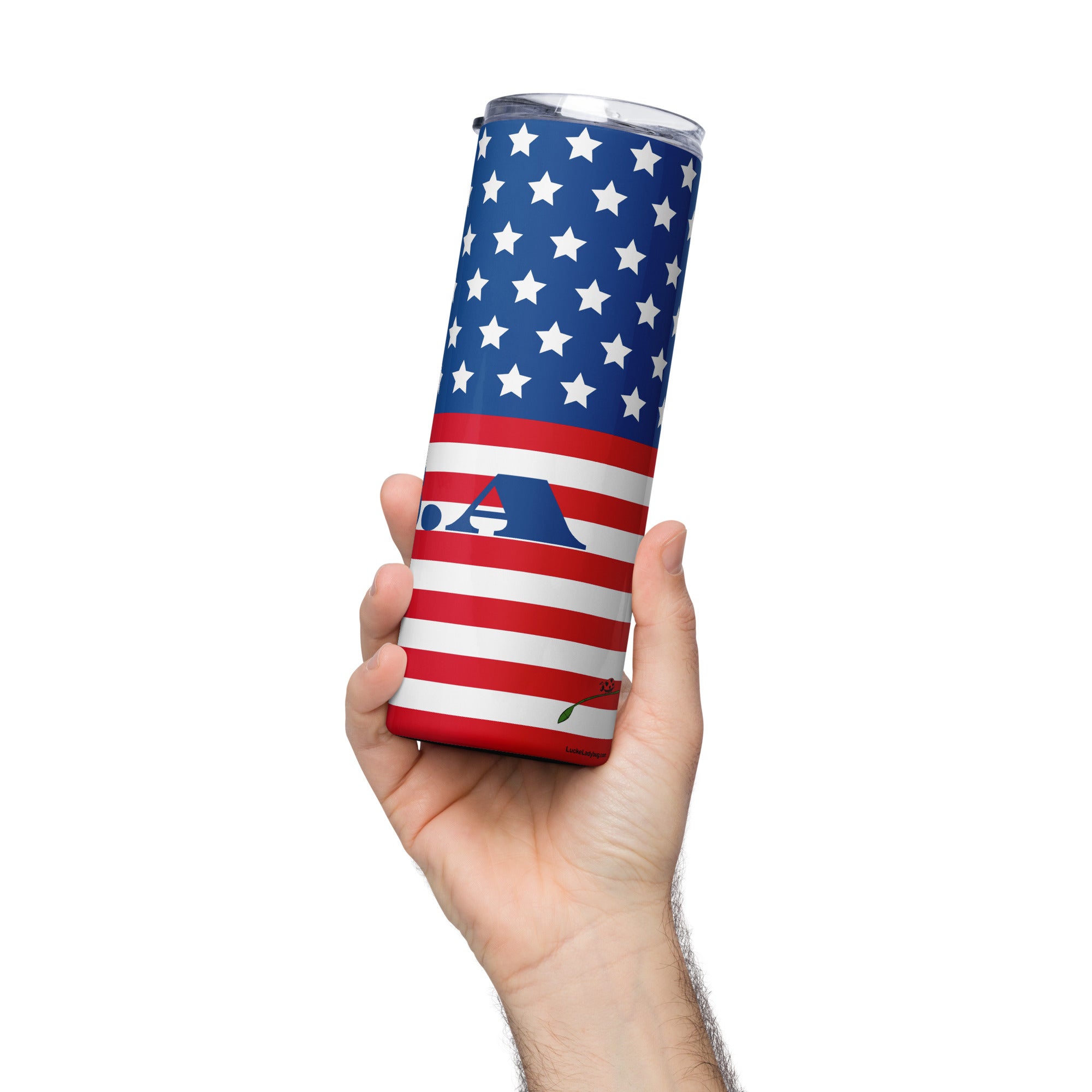 Hand holding LuckeLadybug stainless steel USA flag tumbler with star and stripe design