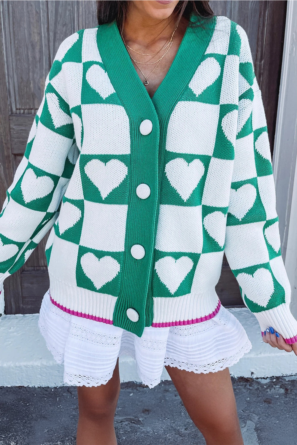 V-Neck Sweater with Heart Design