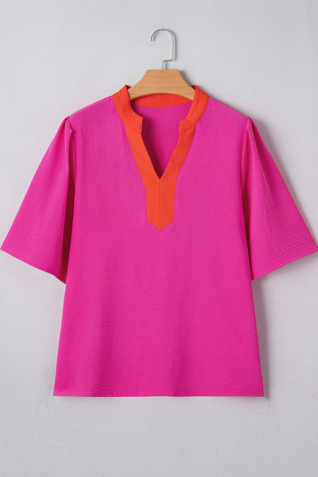 LuckeLadybug LLC Pink V Neck Top with Orange Accents and Short Sleeves