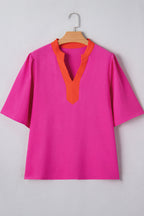 LuckeLadybug LLC Pink V Neck Top with Orange Accents and Short Sleeves