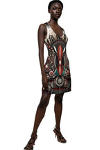 African style racerback dress with vibrant tribal print worn by model with black strappy heels