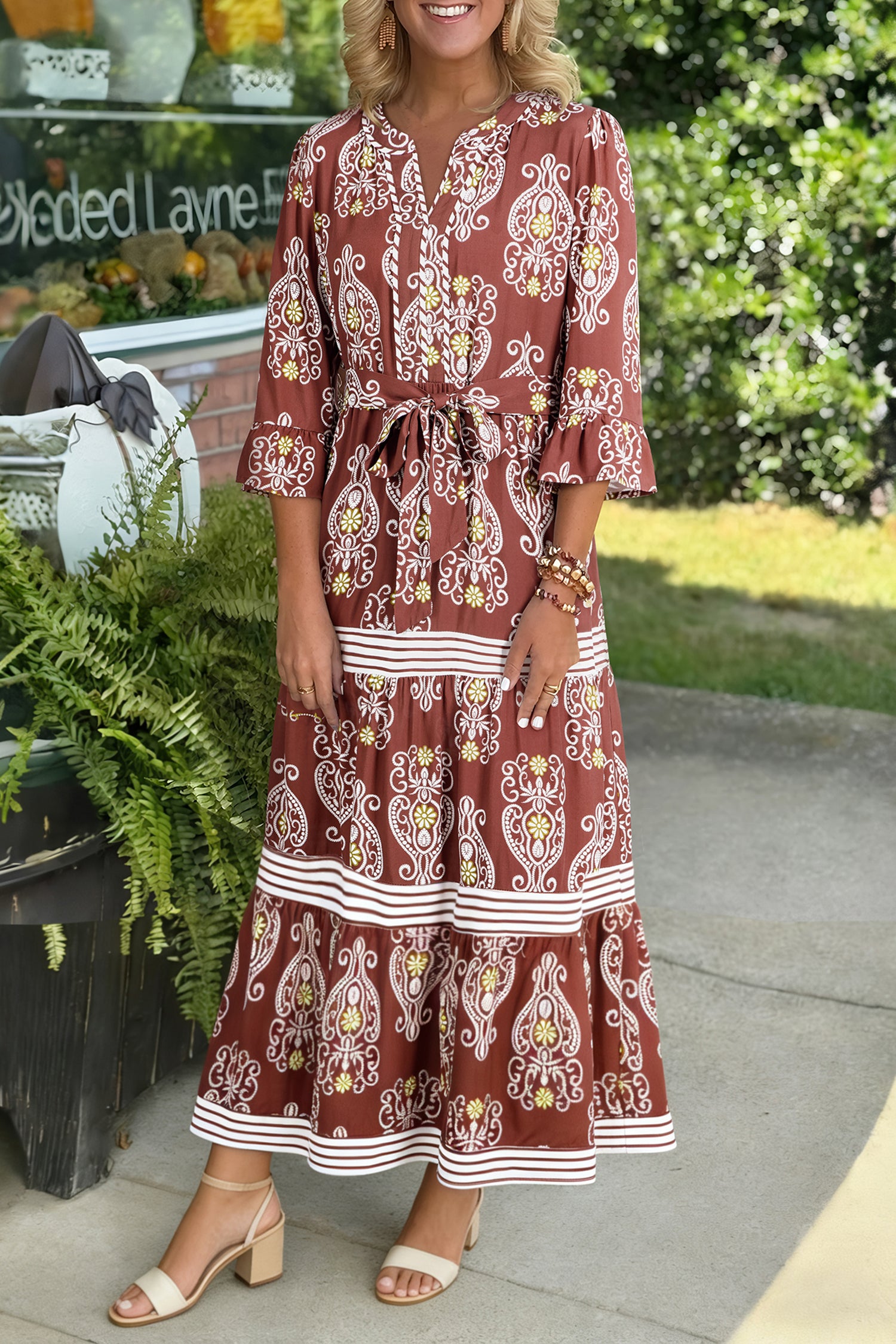 LuckeLadybug LLC Fit & Flare dress in brown with floral patterns and maxi dress style
